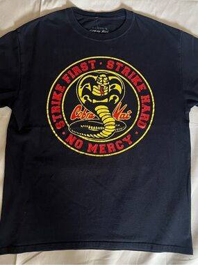 Cobra Kai T-Shirt - Strike First Strike Hard No Mercy. Size Medium
